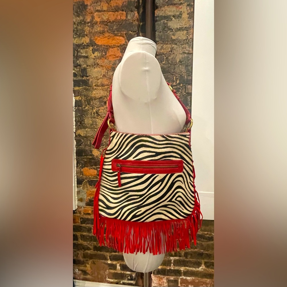 Gorgeous Innue Italian made red leather and zebra calf hair cross body purse.